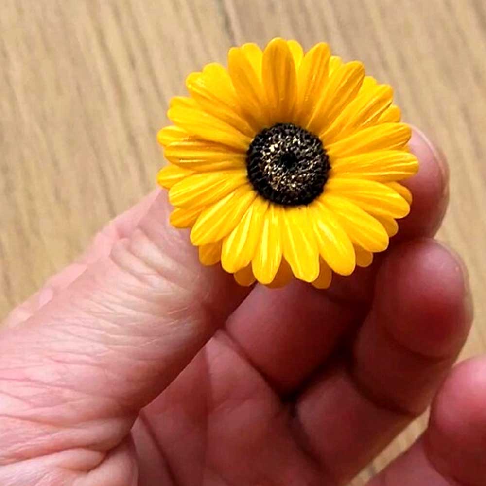 Golden Glow: Gerbera Pin Polymer Clay. 