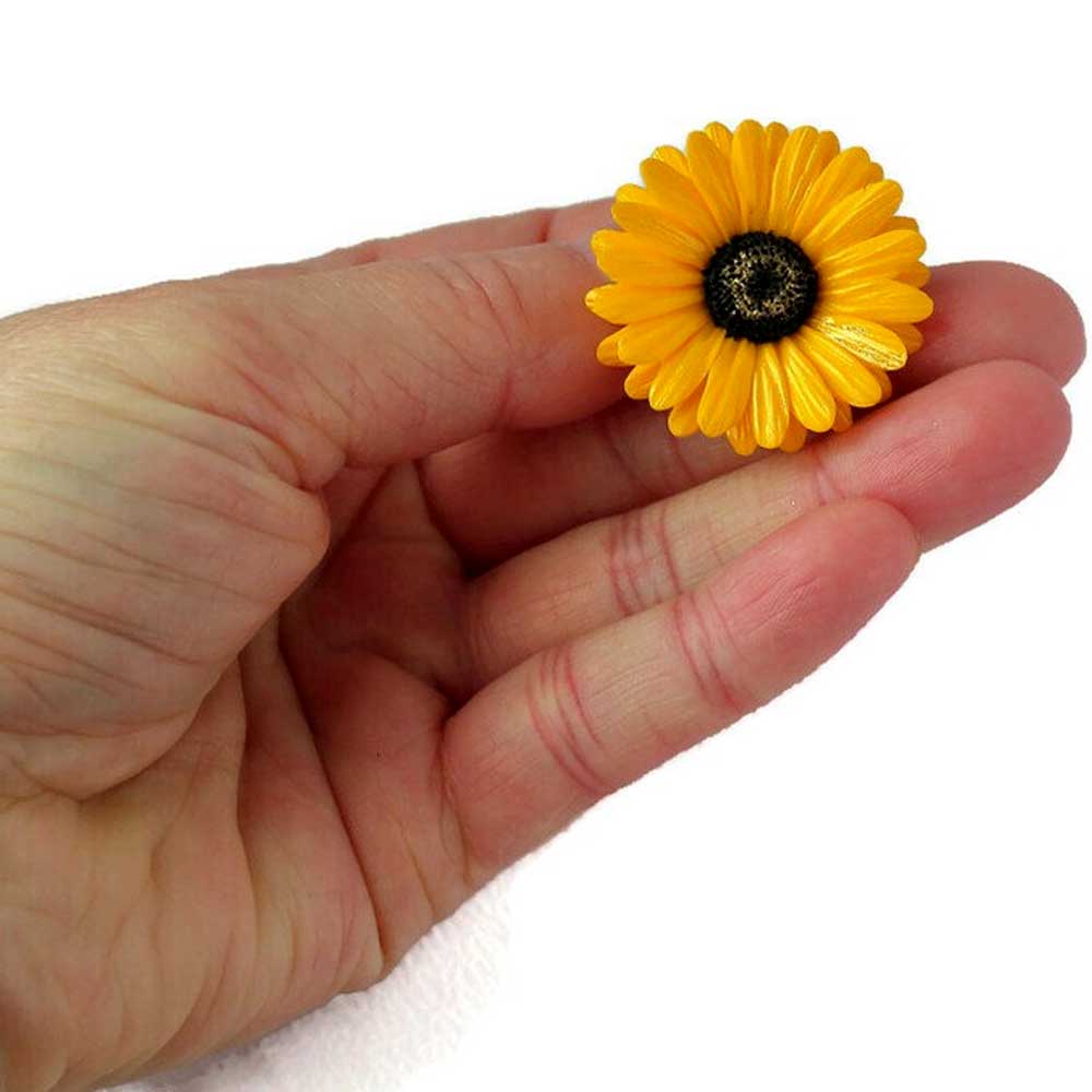 Golden Glow: Gerbera Pin Polymer Clay. 