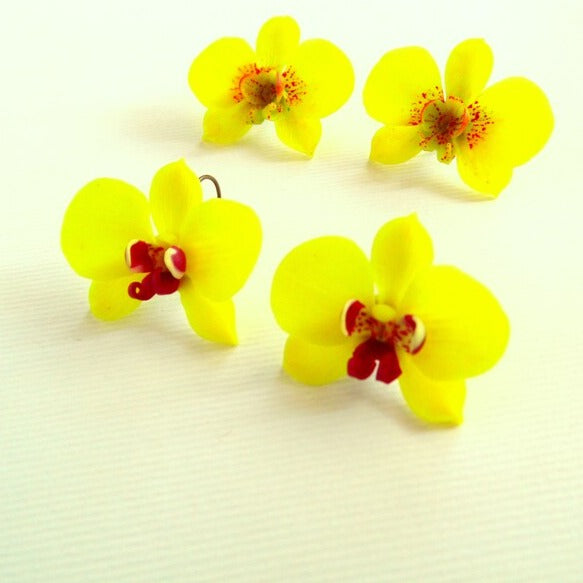 A floral extravaganza: Orchid Earrings Polymer Clay.