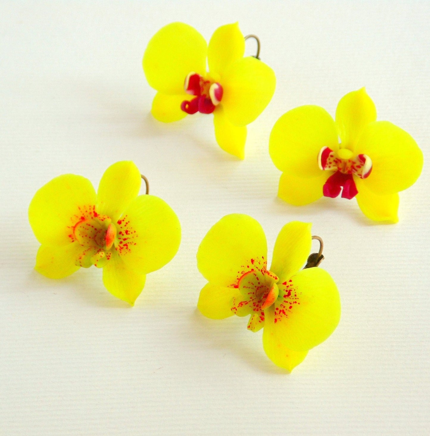 A floral extravaganza: Orchid Earrings Polymer Clay.