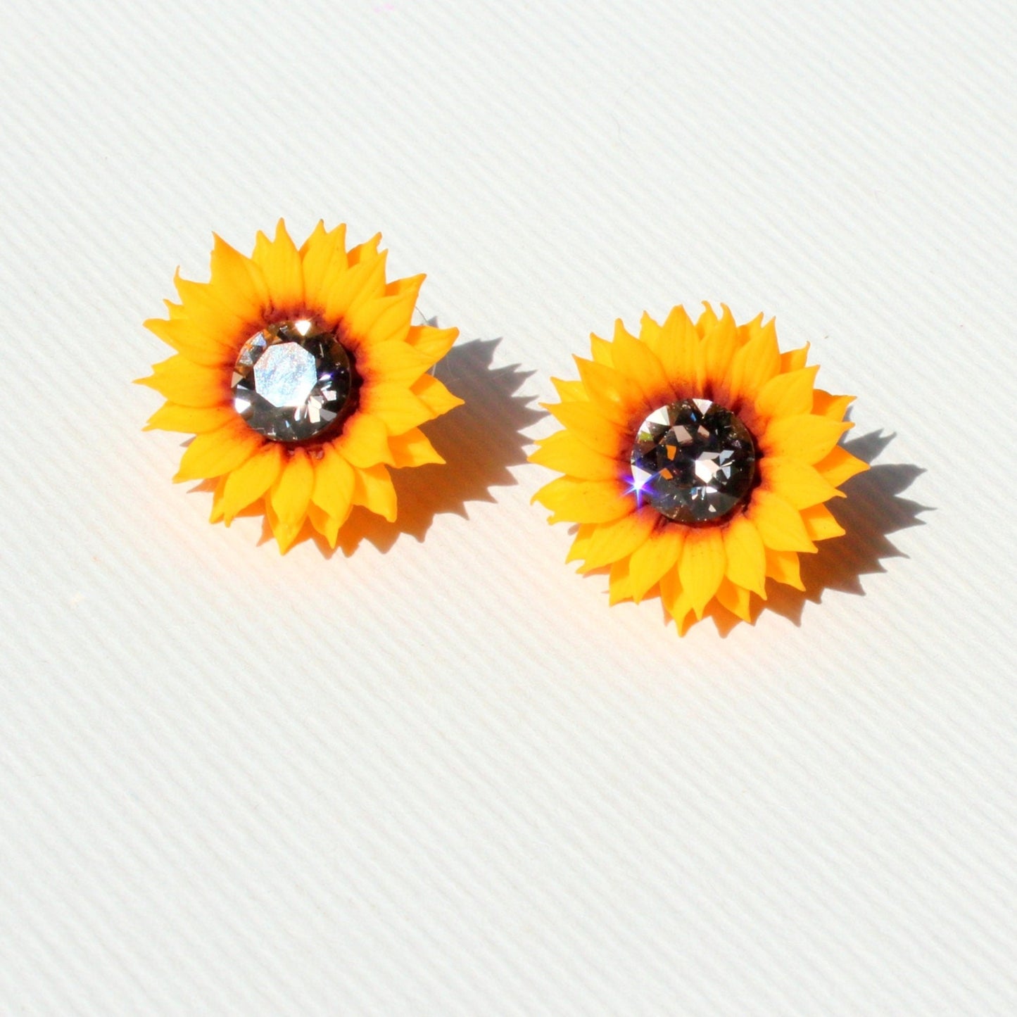 Sun's Embrace: Crystal Sunflower Earrings Polymer Clay.