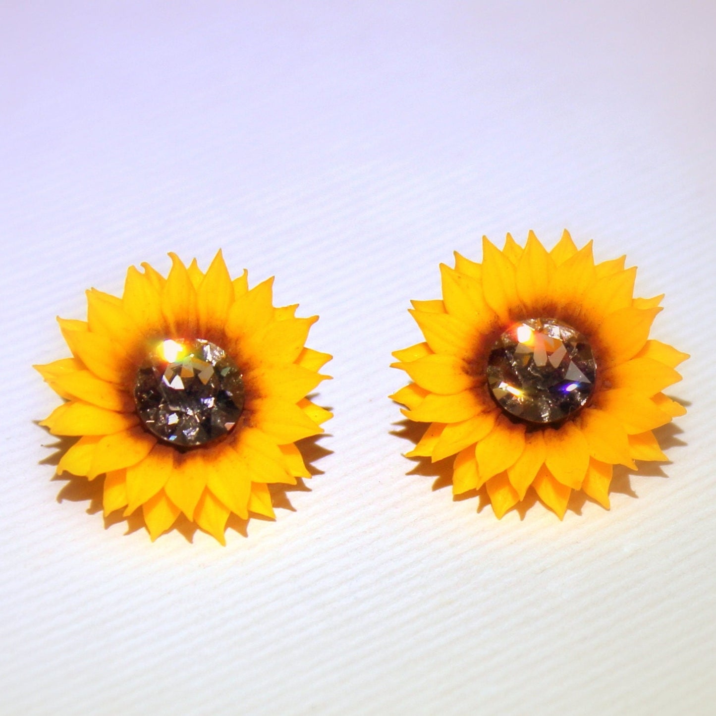 Sun's Embrace: Crystal Sunflower Earrings Polymer Clay.