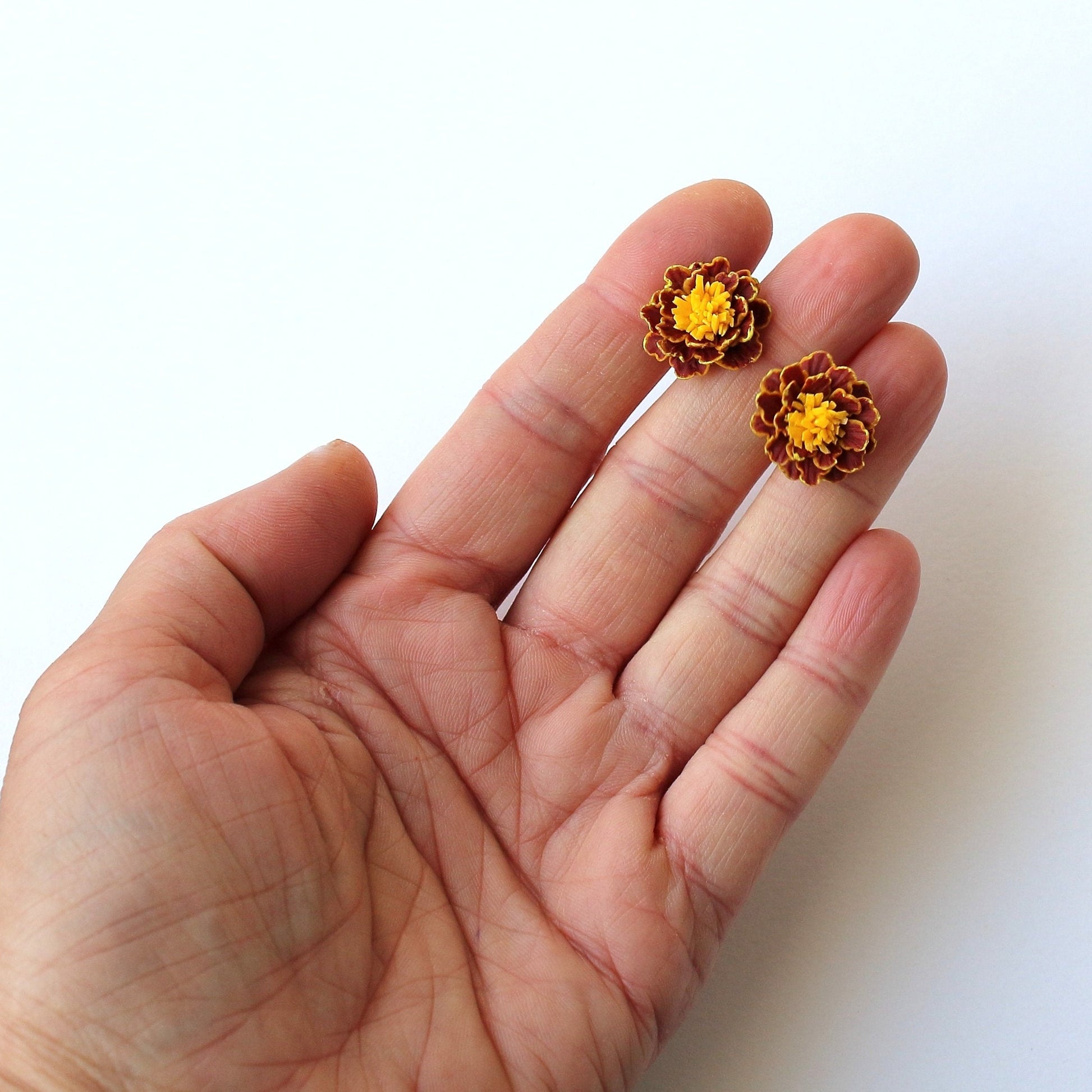 Golden Petals: Marigold Earrings Polymer Clay.