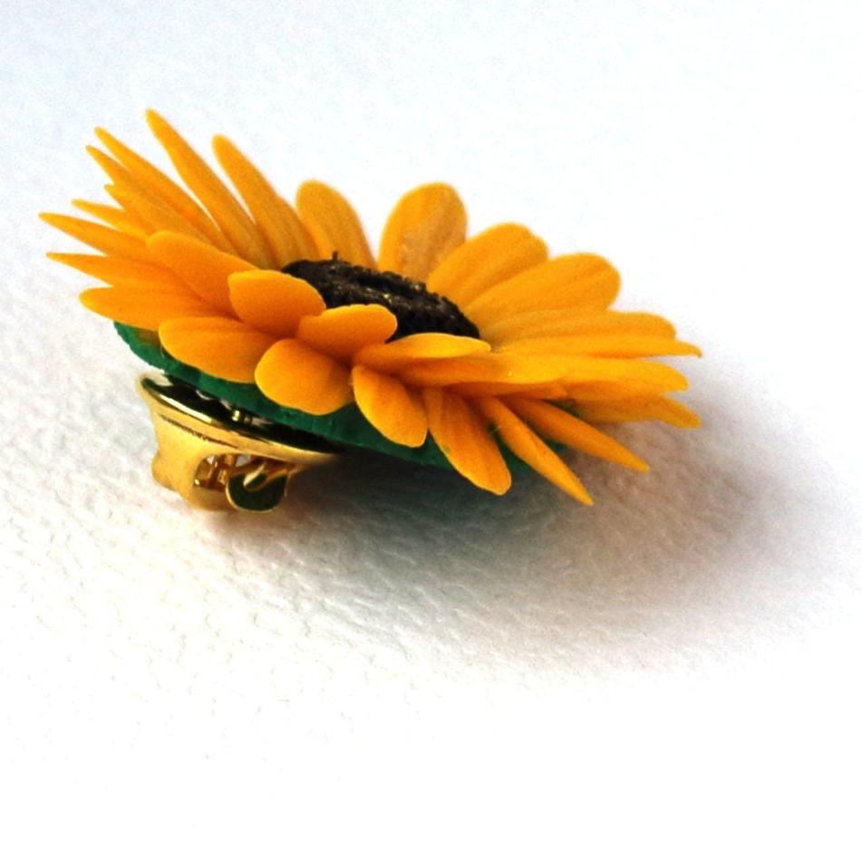 Golden Glow: Gerbera Pin Polymer Clay. 