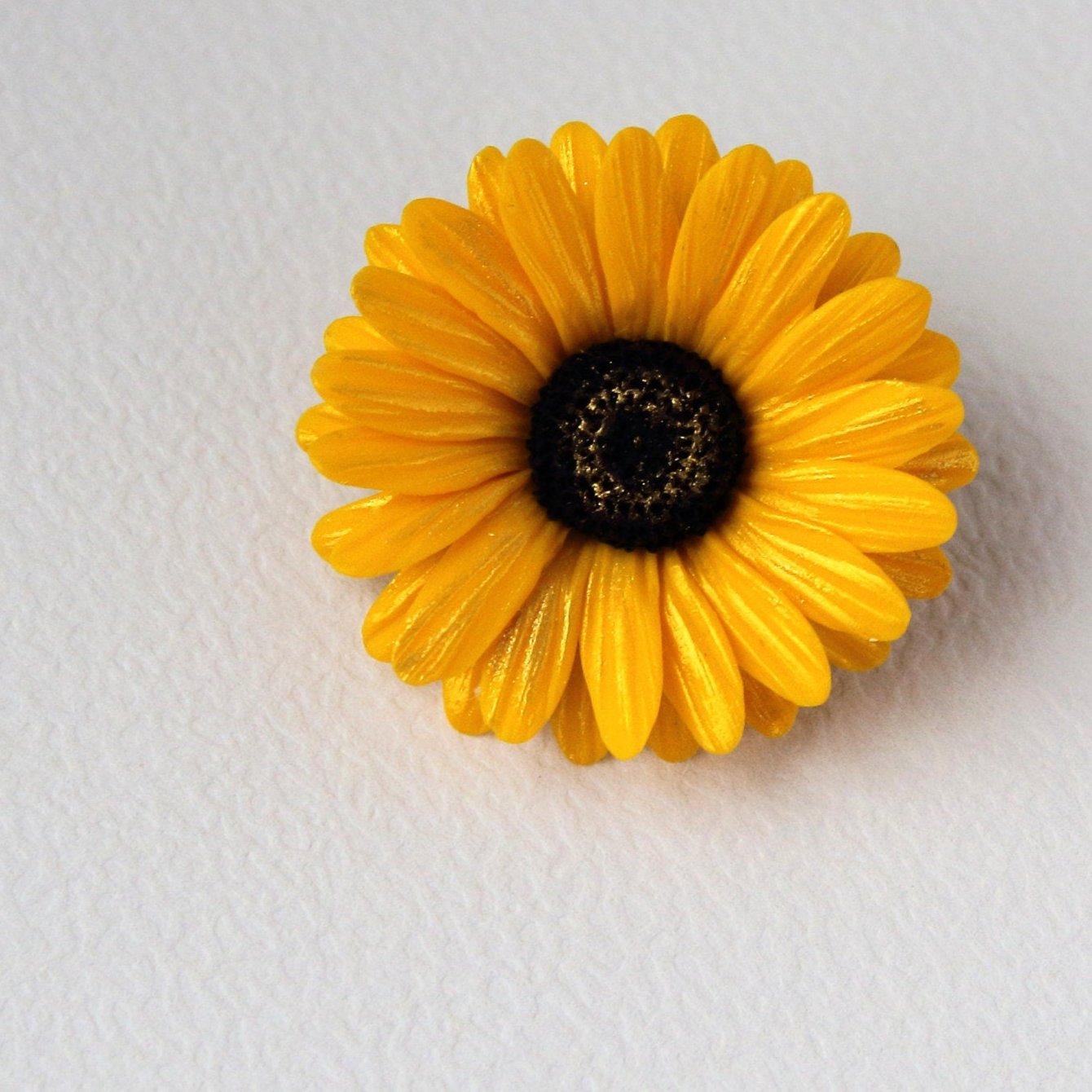 Golden Glow: Gerbera Pin Polymer Clay. 