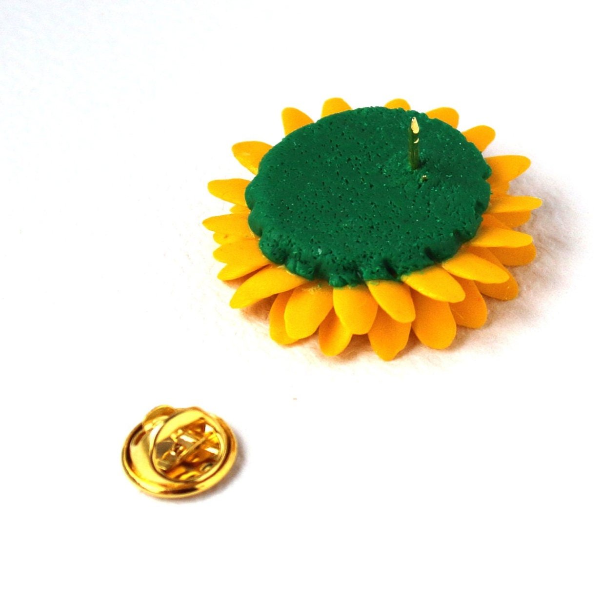 Golden Glow: Gerbera Pin Polymer Clay. 