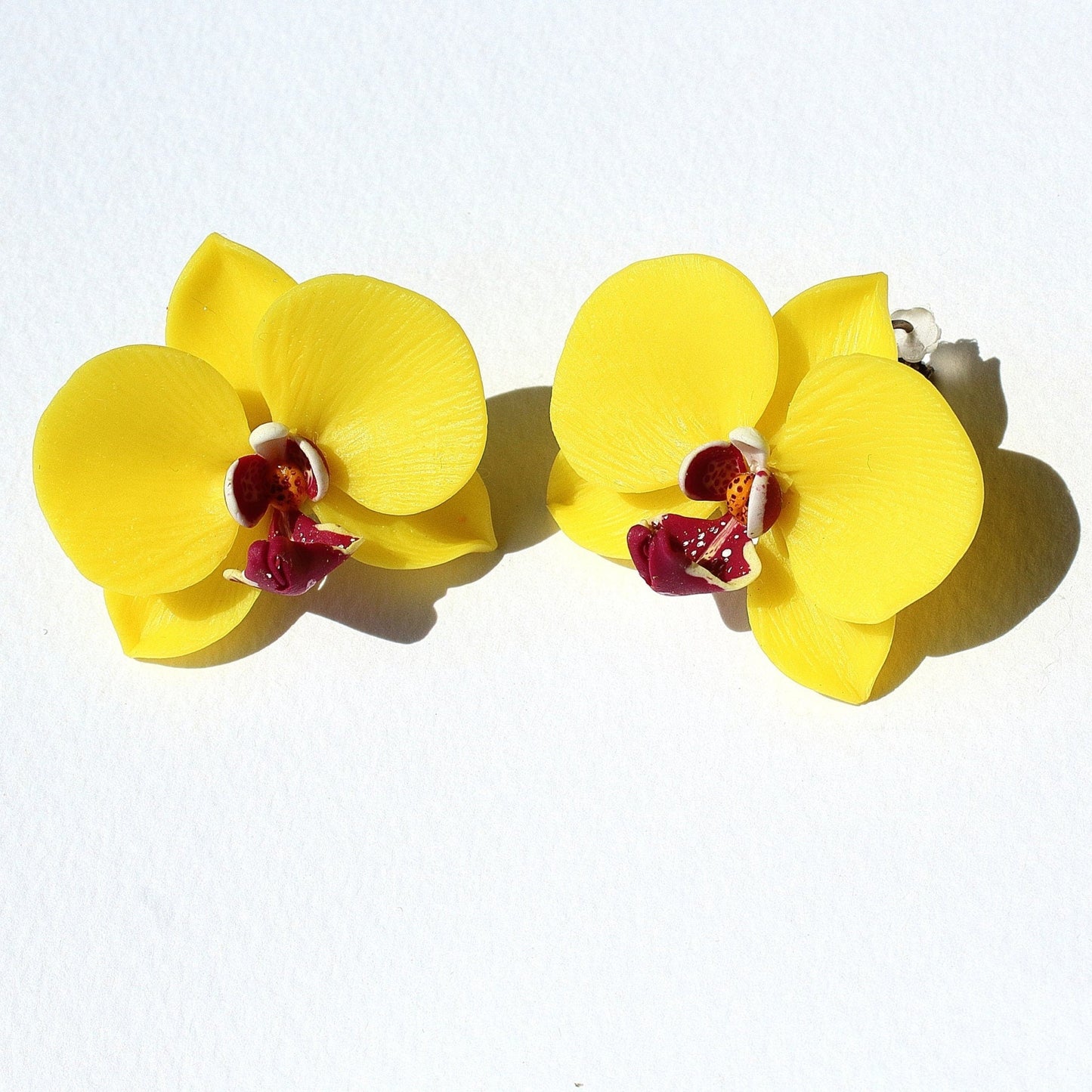 A floral extravaganza: Orchid Earrings Polymer Clay.